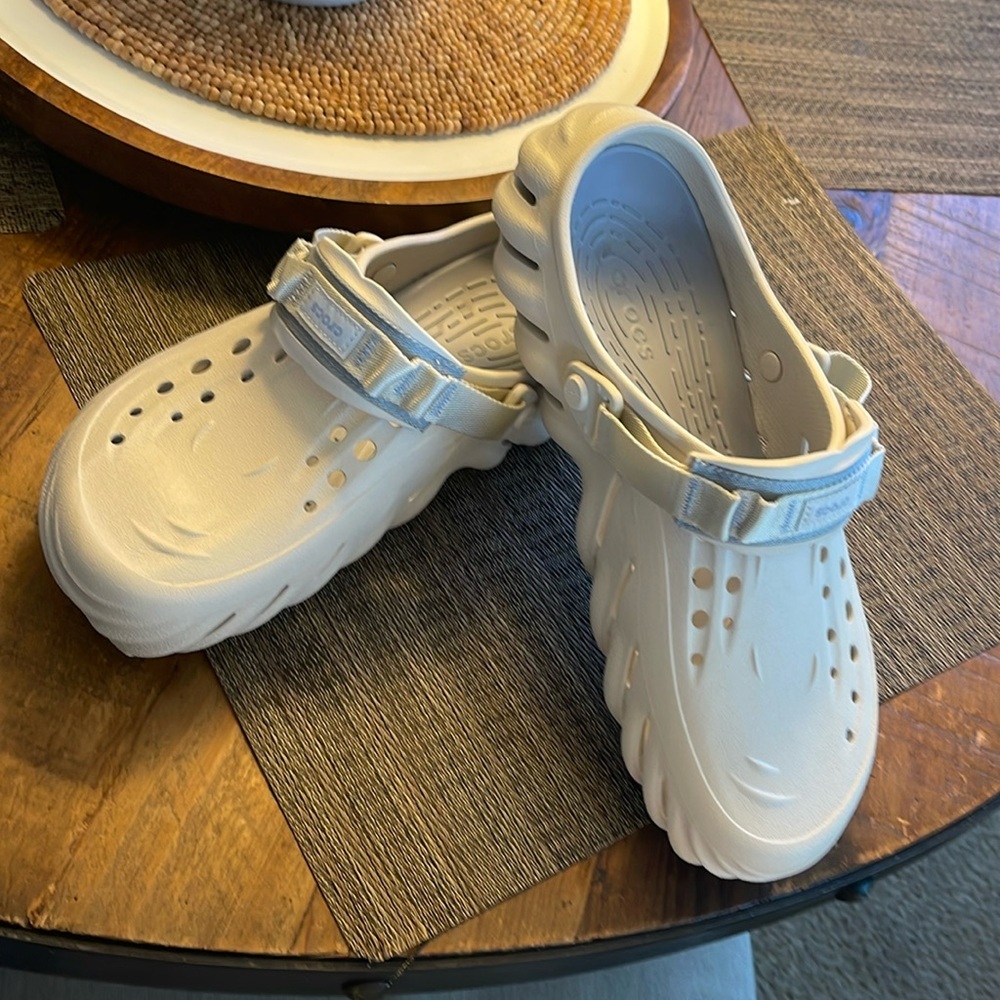 CROCS (Bone colored) Size 13 and while supportive, extremely soft upon the step